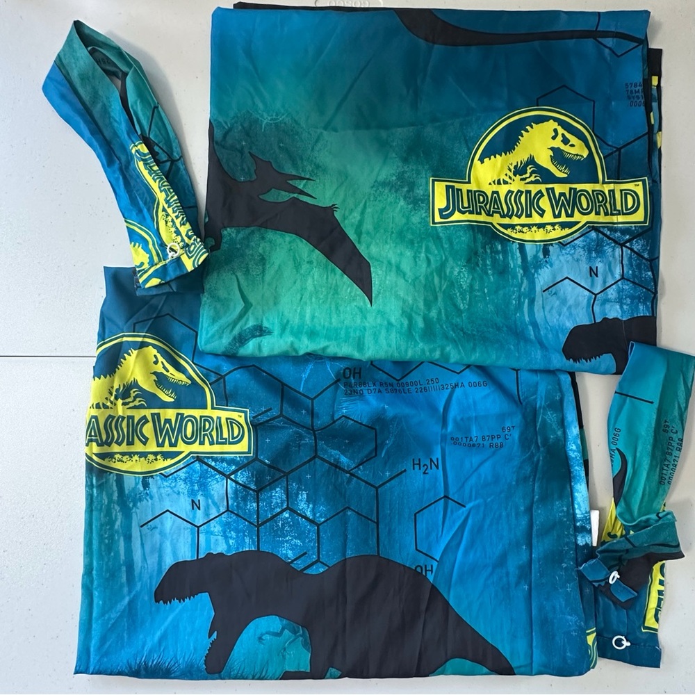 Lot of 2 Jurassic World curtains w/ ties approx 64”x39.5”‎ blue yellow green
